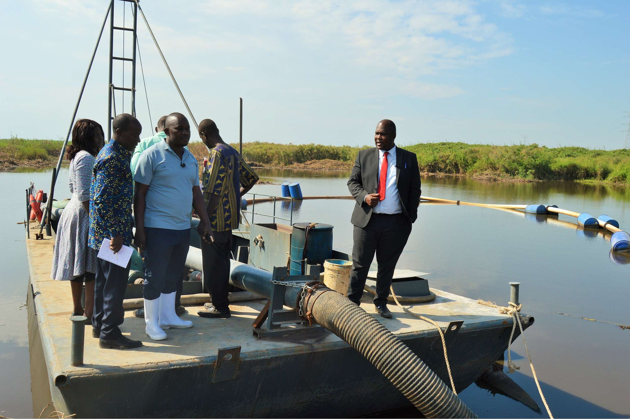 District Chairperson-Hon Kawuki Simon Peter together with the NRM Chairperson-Mr Kaweesi Sulaiman visiting sand mines in Lwera