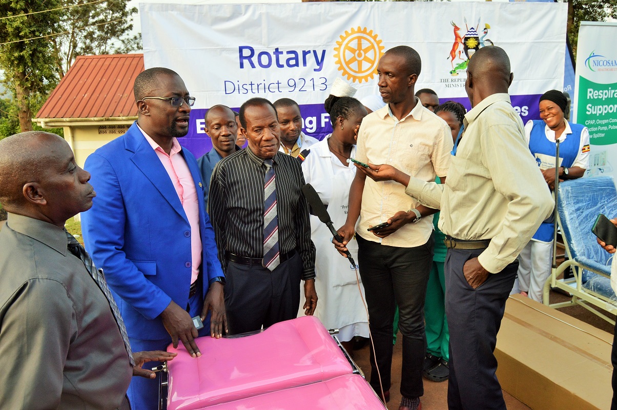 Assistant RDC- Mr. Mwanje Saad together with District Vice Chairman - Mr. Kawooya Vicky and team receive medical equipment on behalf of Health Centers in Mpigi