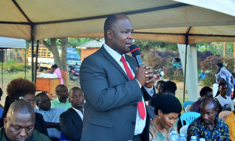 District Chairperson-Hon. Kawuki Simon Peter addressing community during Community Baraza held at Nabyewanga in Nkozi Sub-County